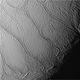 Detailed surface features of Enceladus’ frozen surface.